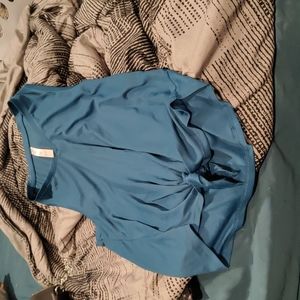 Teal sleeveless shirt Sold